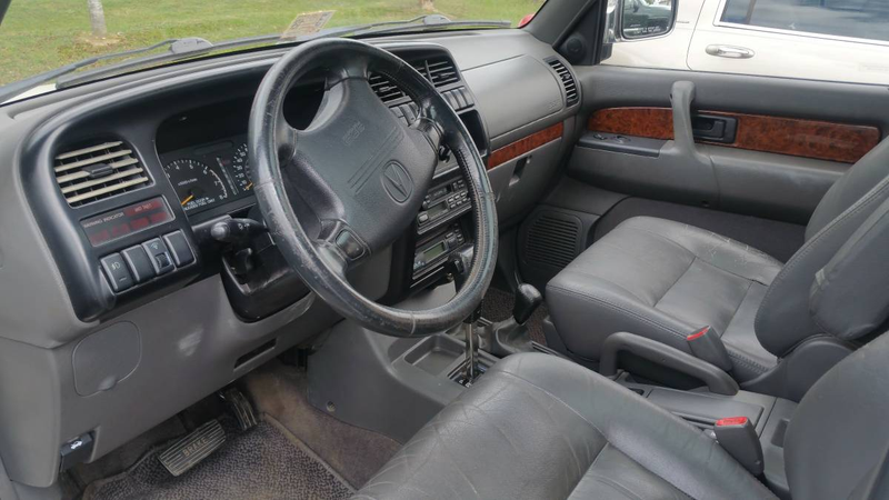 Illustration for article titled For $2,350, Would You Adopt This 1997 Acura SLX Brother From Another Mother?